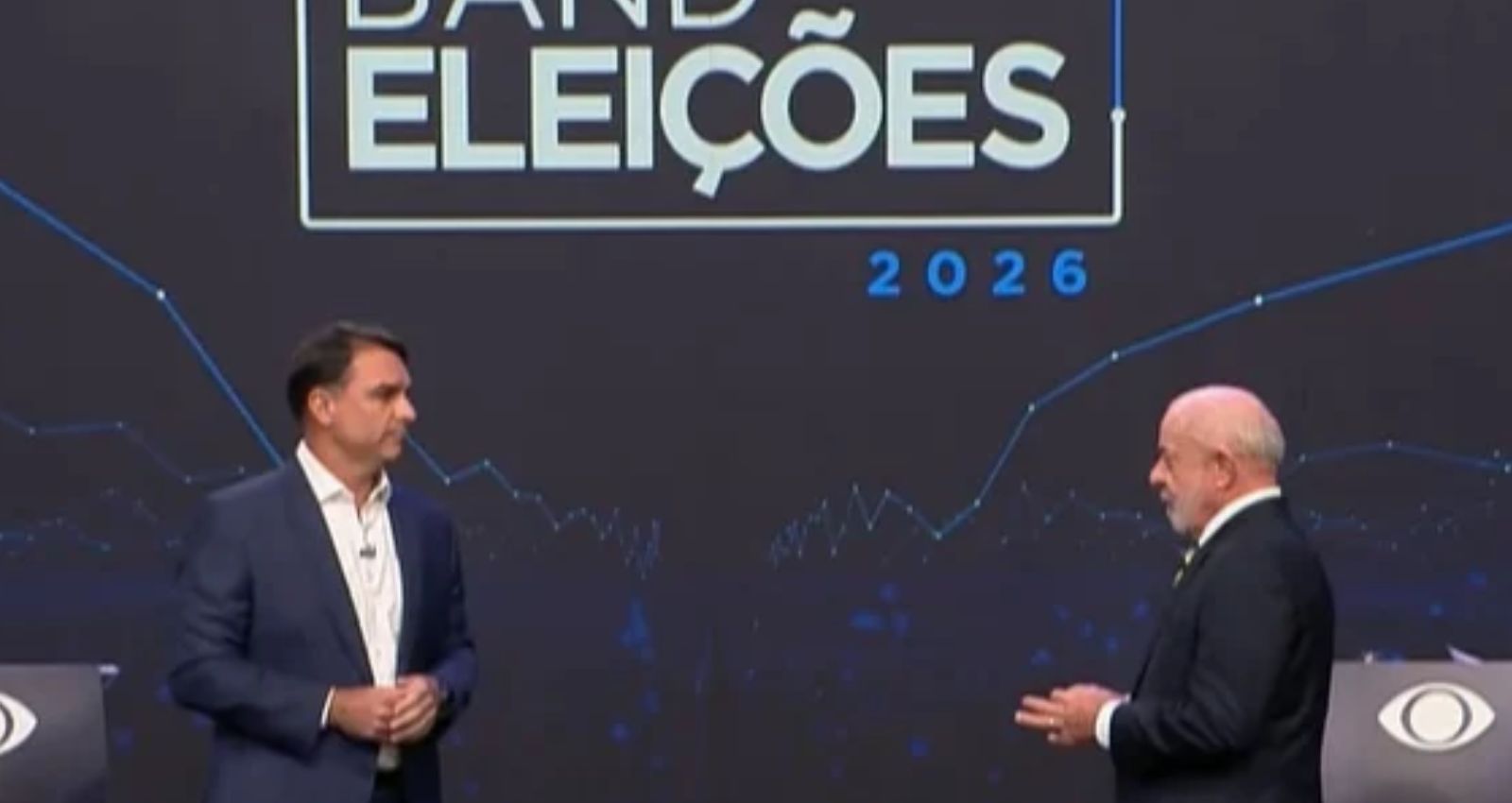 Debate da Band: Em primeiro bloco tenso, Lula e Flávio Bolsonaro trocam provocações sobre Luchsinger e Dark Horse